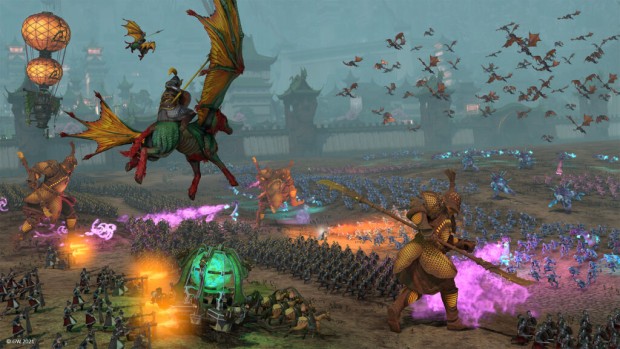 Total War: Warhammer 3 screenshot showing a battle near a city