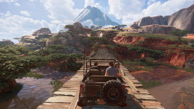 Remastered version of Uncharted Legacy of Thieves Collection PC screenshot showing a jeep and lovely scenery
