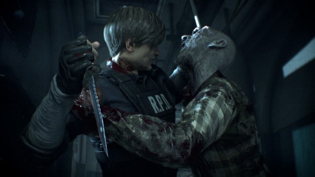 Resident Evil 2 screenshot of a zombie attacking Leon