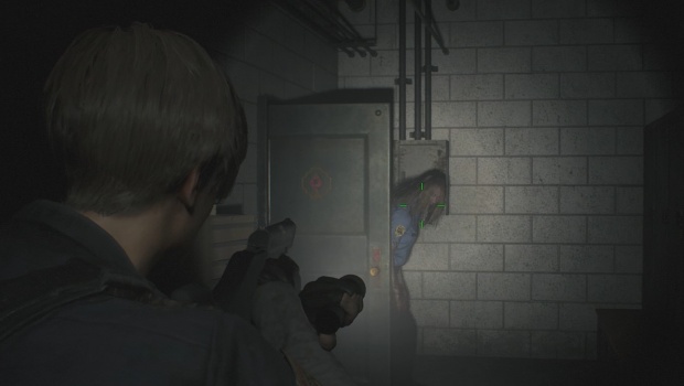 Resident Evil 2 remake screenshot of zombies busting through doors