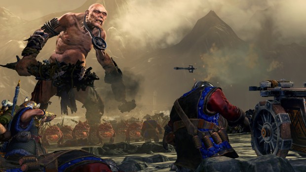 Total War: Warhammer screenshot of Greenskins fighting Dwarfs with a giant