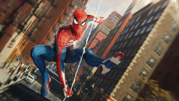 Insomniac Games' Spider-Man Remastered screenshot of spidey swinging through the streets on PC