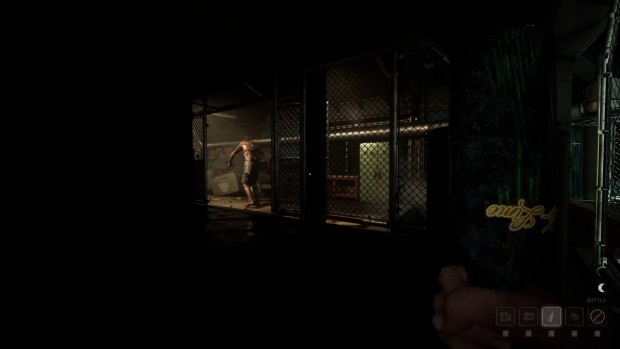 The Outlast Trials screenshot of the player hiding while a giant grunt passes by